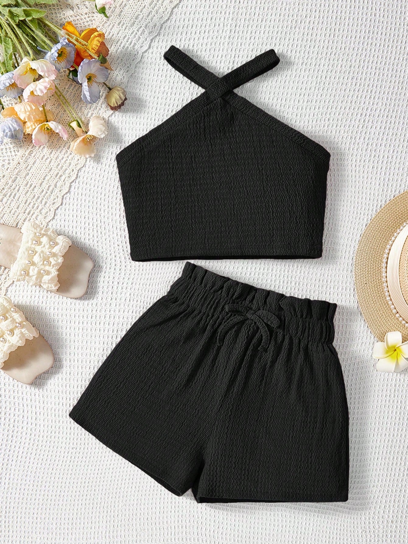 Tween girl 2-piece casual outfit set featuring a solid beige knit halter sleeveless top with belted detail and matching shorts.
