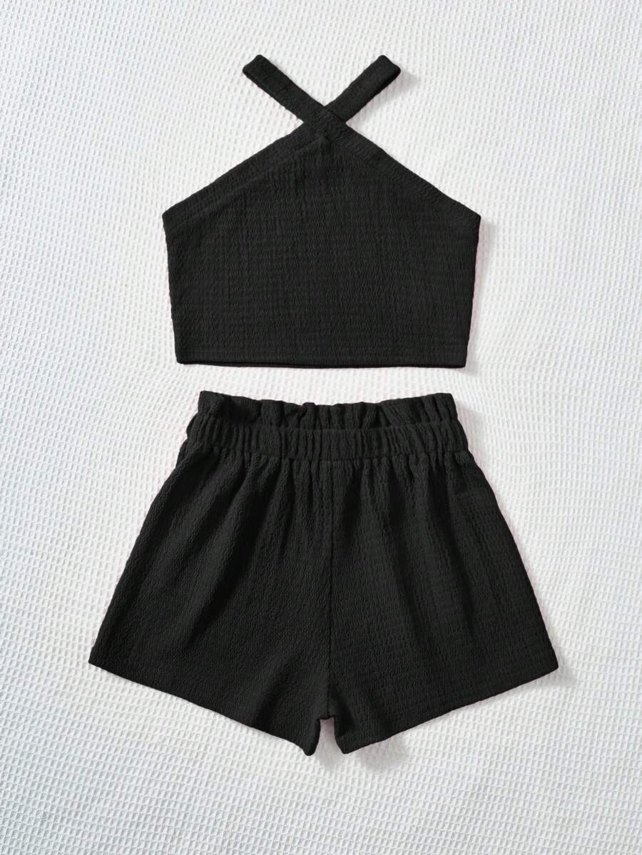 Tween girl 2-piece casual outfit set featuring a solid beige knit halter sleeveless top with belted detail and matching shorts.