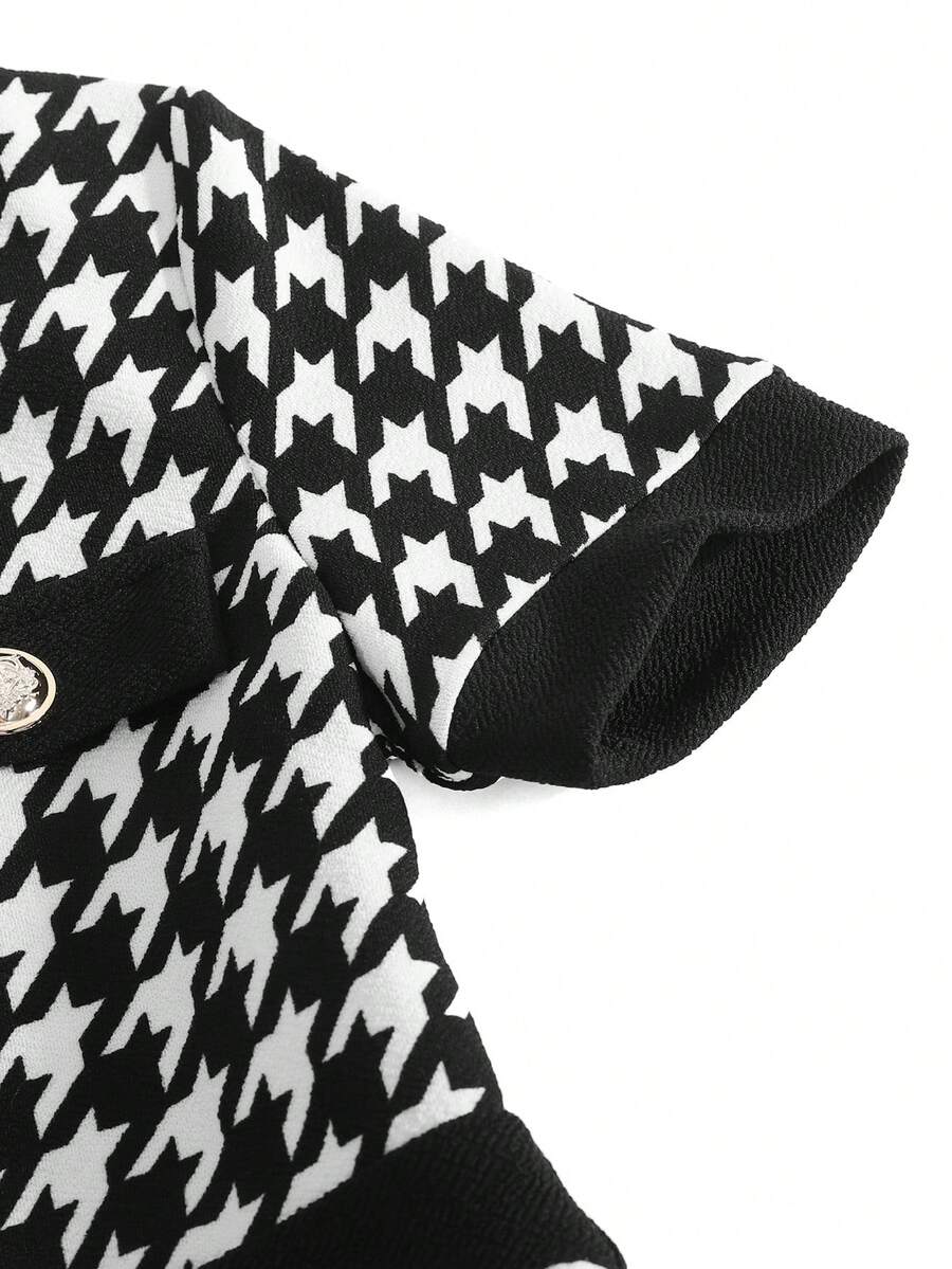 Nova Glow tween girls black and white houndstooth print short sleeve A-line dress with decorative buttons and crew neckline.