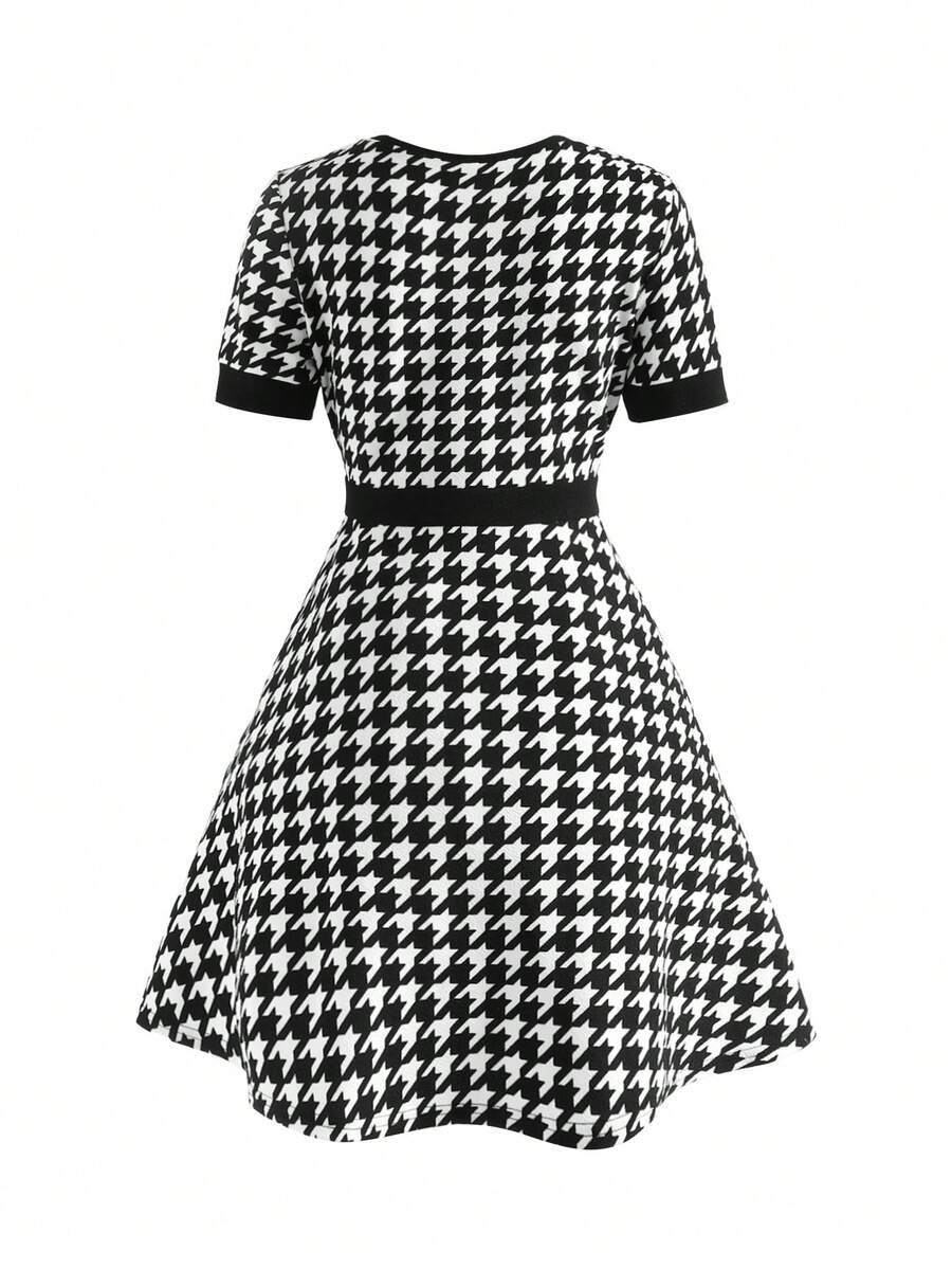 Nova Glow tween girls black and white houndstooth print short sleeve A-line dress with decorative buttons and crew neckline.
