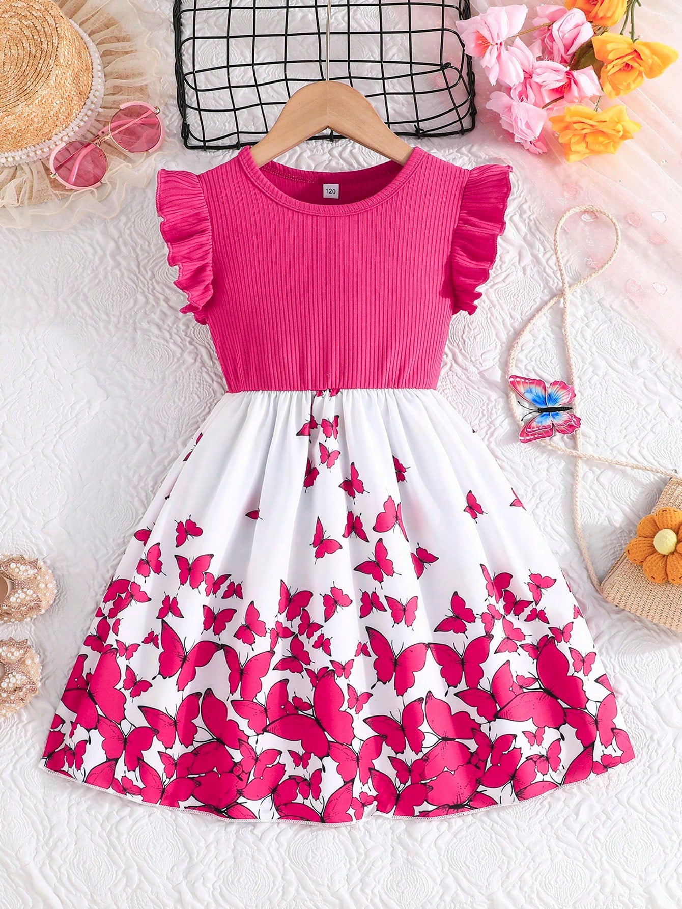 Tween girls blue floral print A-line midi dress featuring round neck, ruffle and contrast mesh details, high waist, and flared hem.