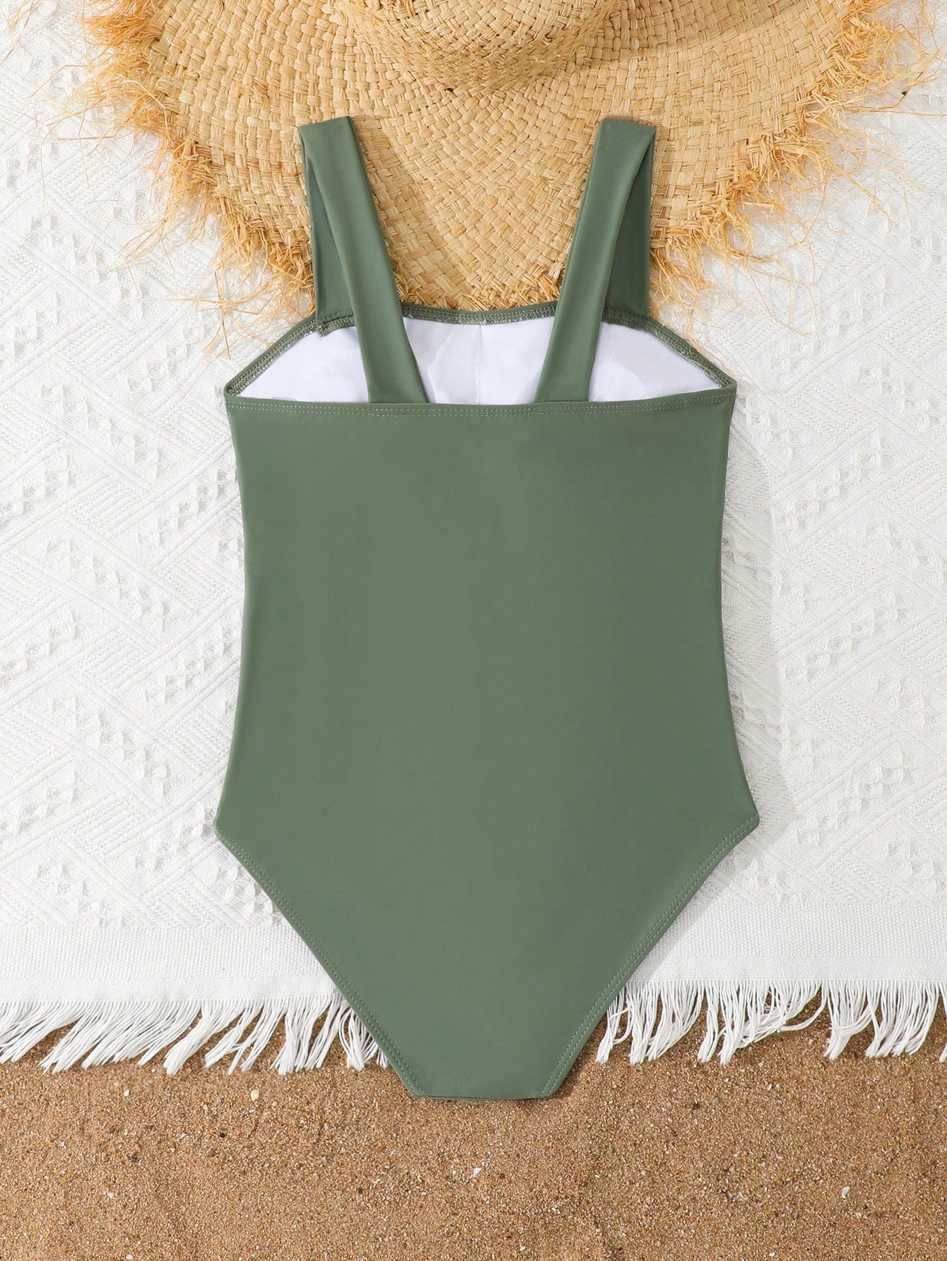 Tween girls purple one-piece swimsuit with strap neckline, cut-out detail, plain vacation style, wireless bra, and mid-waist bottom