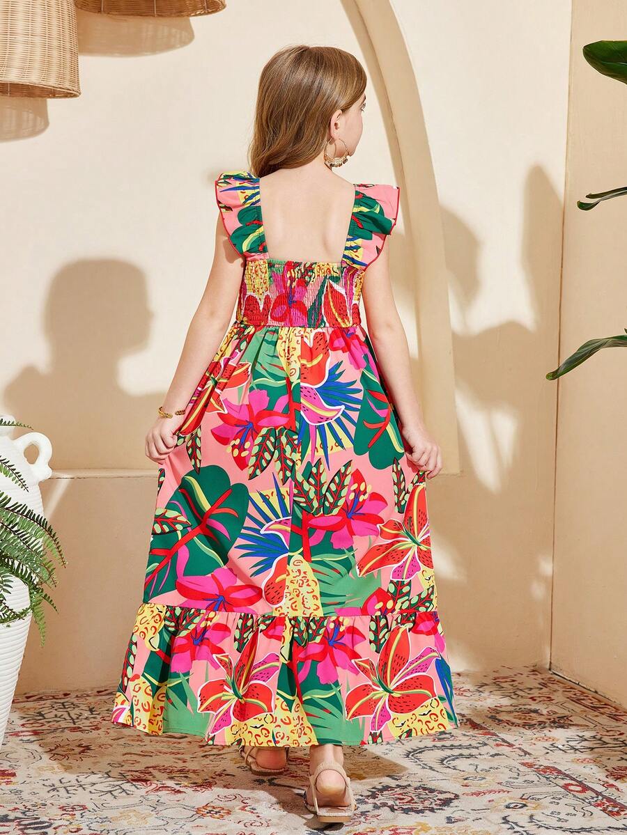 Blue floral print long vacation dress for tween girls featuring an A-line high waist silhouette with ruffle details and spaghetti straps.