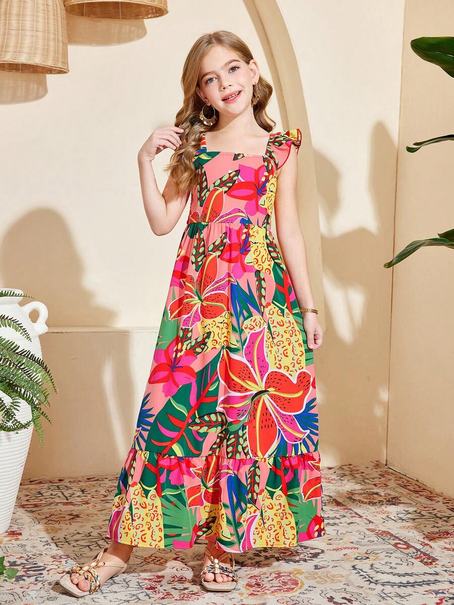 Blue floral print long vacation dress for tween girls featuring an A-line high waist silhouette with ruffle details and spaghetti straps.
