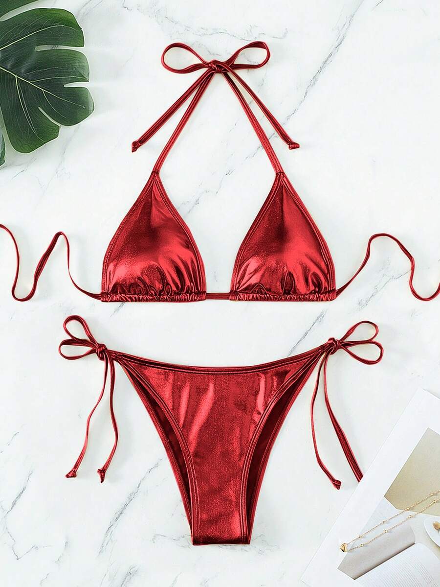 Women's two-piece halter triangle bikini set featuring tie-side high-waist bottoms and tie-back top.