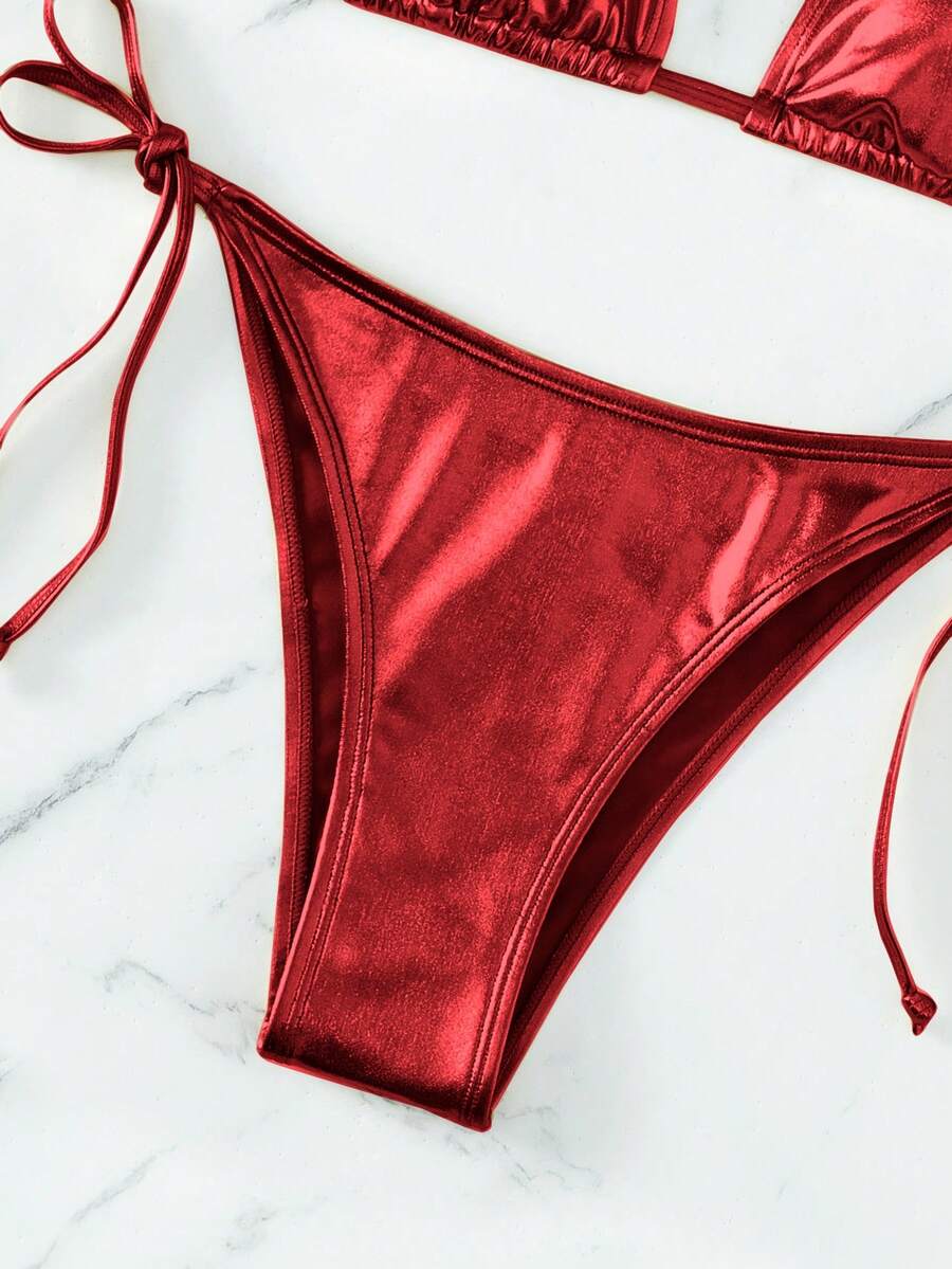 Women's two-piece halter triangle bikini set featuring tie-side high-waist bottoms and tie-back top.