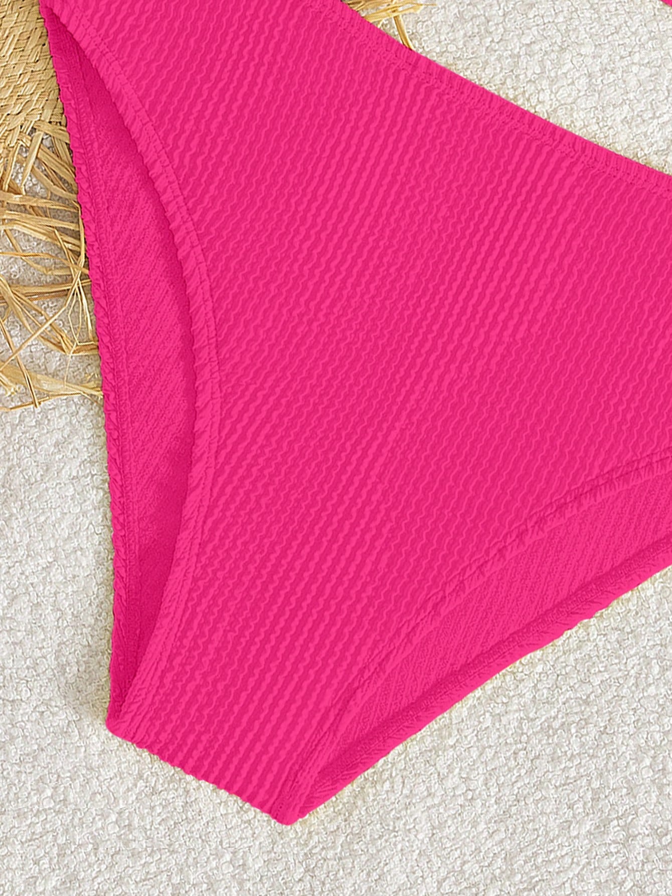Tween girls two-piece bikini swimwear set with a solid color textured design, spaghetti strap top, wireless bra, and mid-waist lined bikini bottoms.