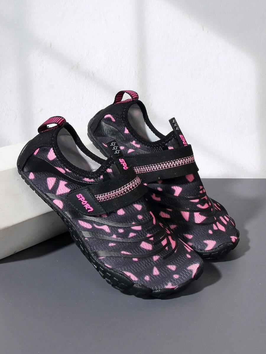 Boys green floral pattern lightweight mesh water shoes with non-slip rubber outsole and hook loop closure.