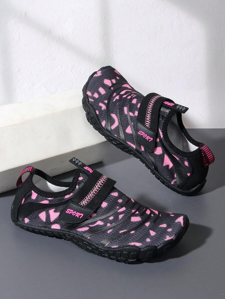 Boys green floral pattern lightweight mesh water shoes with non-slip rubber outsole and hook loop closure.