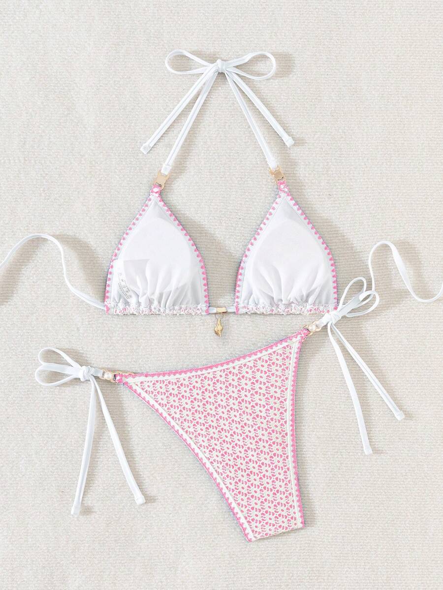 Women's triangle bikini set with contrast lace wireless bra top and ultra high waist tie side bottoms.
