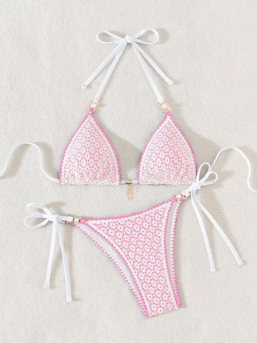 Women's triangle bikini set with contrast lace wireless bra top and ultra high waist tie side bottoms.
