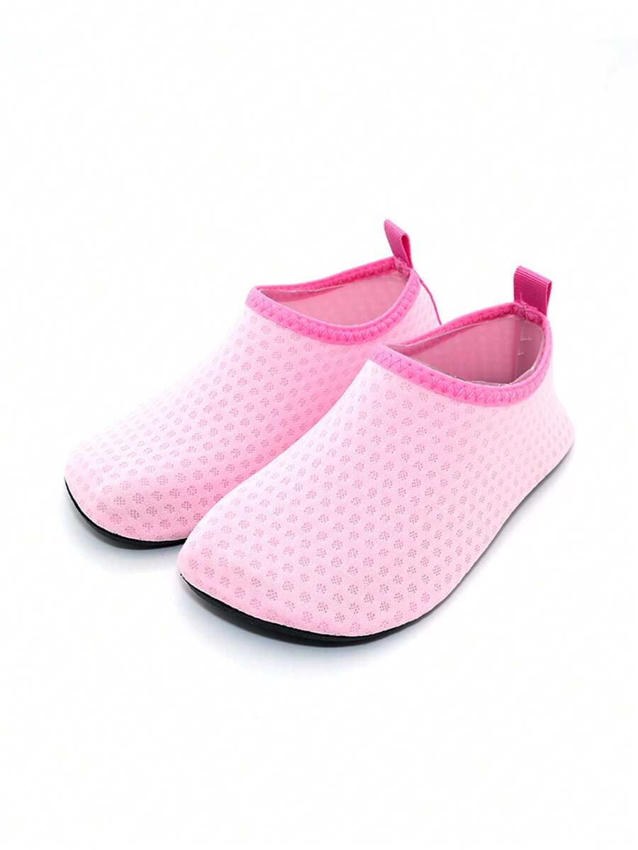 Boys breathable slip-on aqua water shoes featuring contrast binding and non-slip TPR soles for beach and outdoor activities.