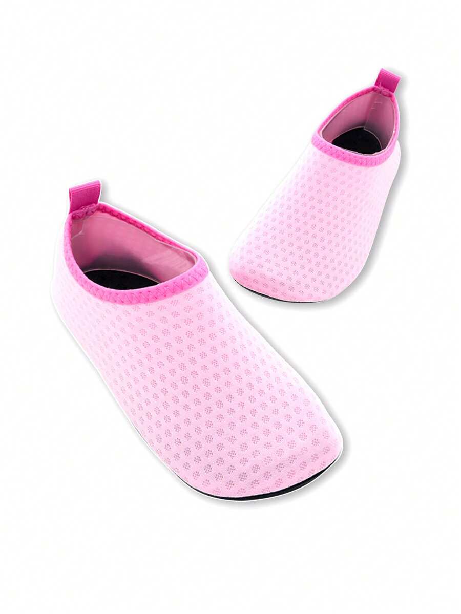 Boys breathable slip-on aqua water shoes featuring contrast binding and non-slip TPR soles for beach and outdoor activities.