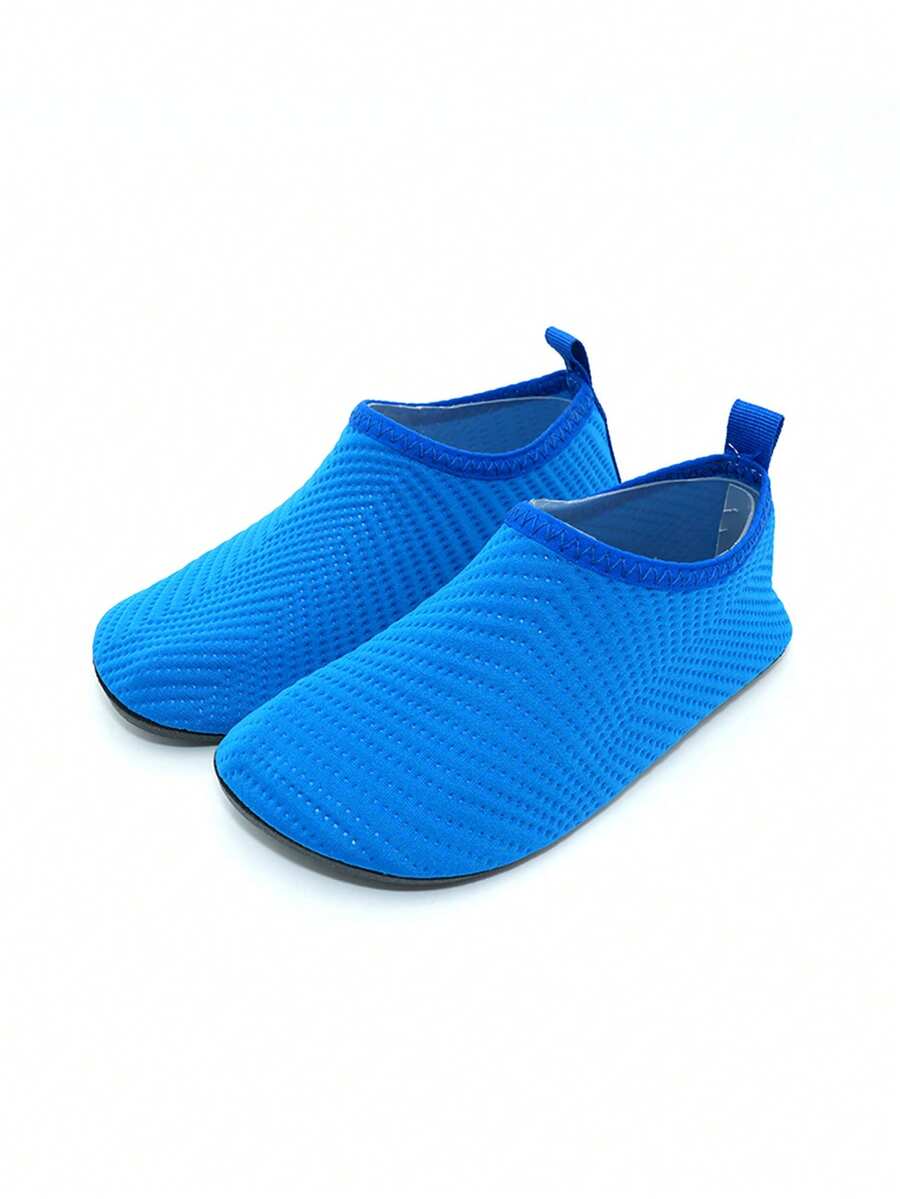 Boys breathable slip-on aqua water shoes featuring contrast binding and non-slip TPR soles for beach and outdoor activities.