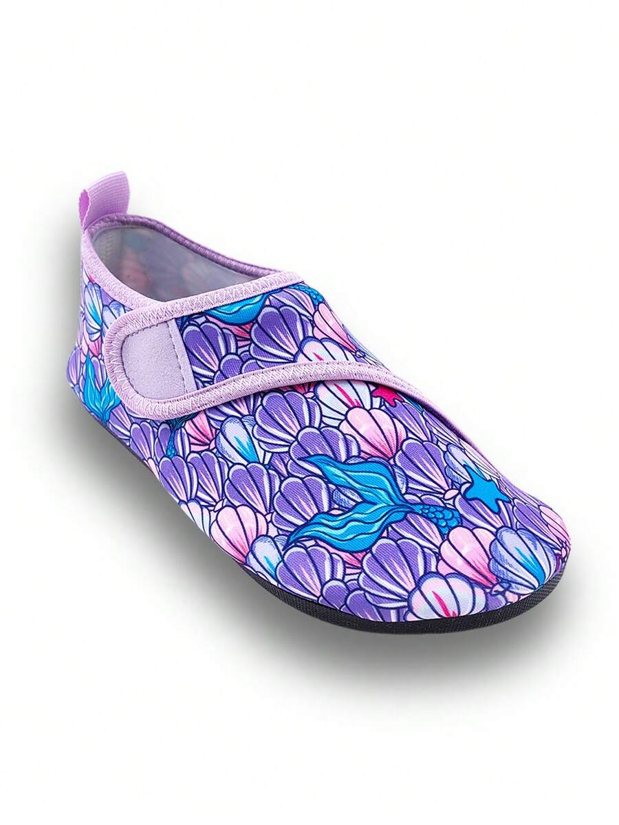 Blue kids water shoes with a shark print pattern, breathable fabric upper, and secure hook and loop closure.