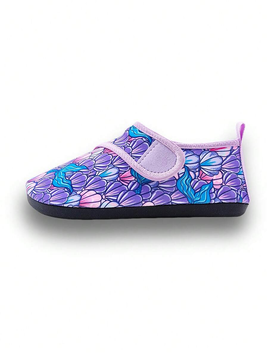 Blue kids water shoes with a shark print pattern, breathable fabric upper, and secure hook and loop closure.