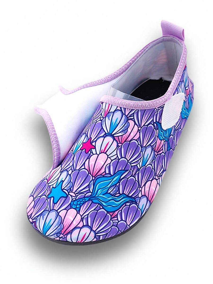 Blue kids water shoes with a shark print pattern, breathable fabric upper, and secure hook and loop closure.