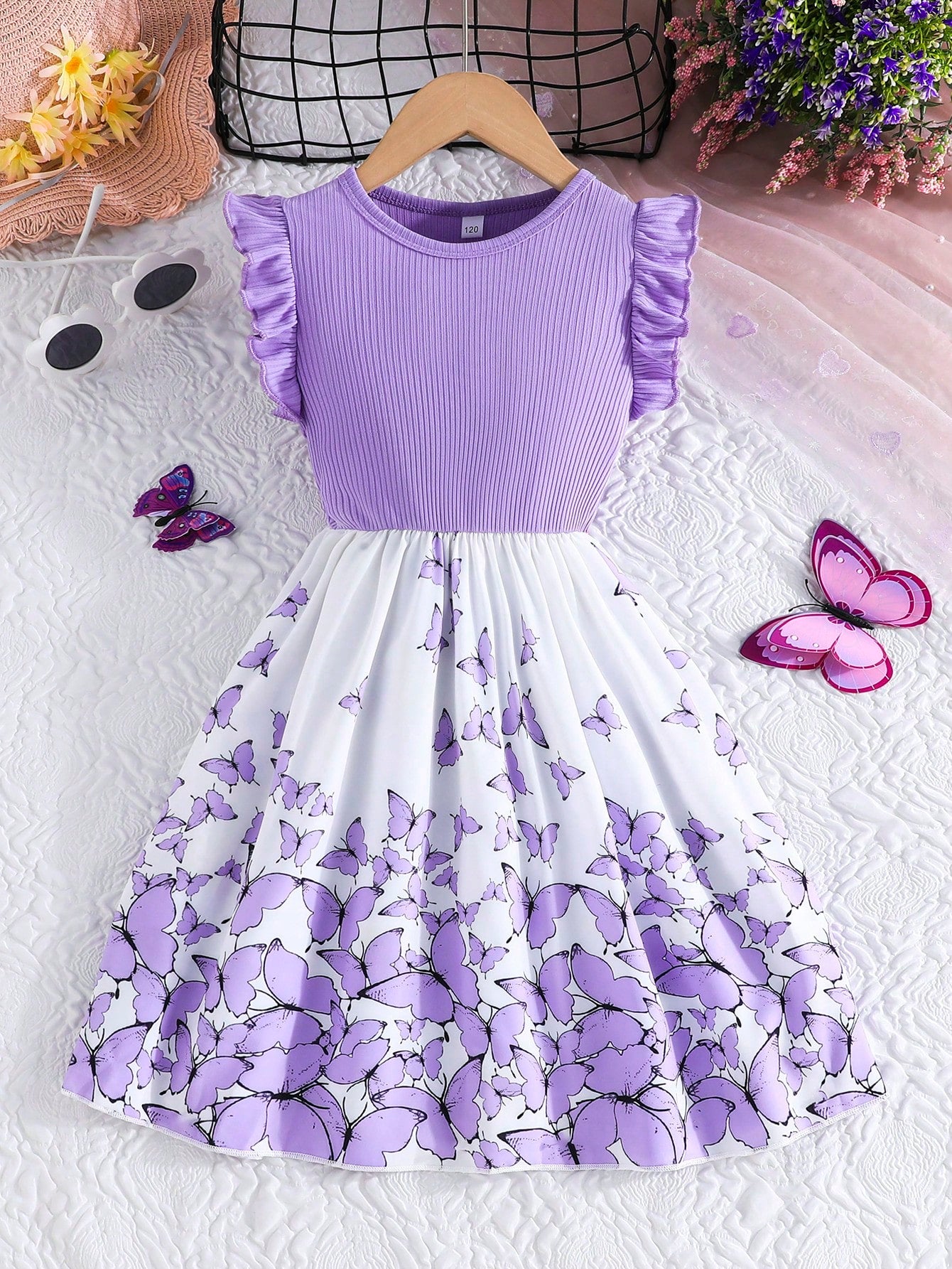 Tween girls blue floral print A-line midi dress featuring round neck, ruffle and contrast mesh details, high waist, and flared hem.
