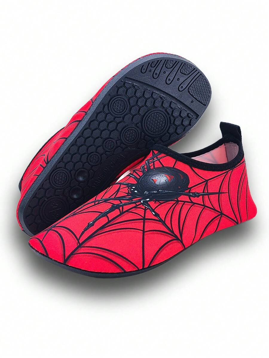 Boys red slip-on water shoes with spider pattern, breathable fabric upper, contrast binding details, and soft TPR outsole.