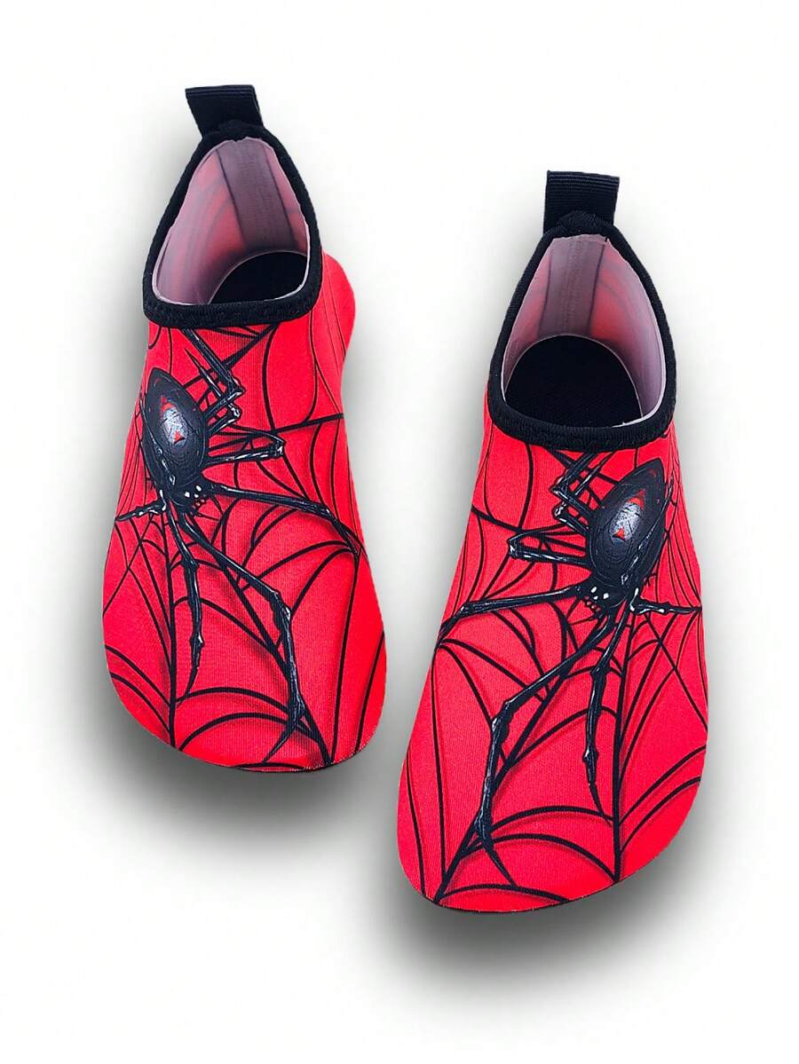 Boys red slip-on water shoes with spider pattern, breathable fabric upper, contrast binding details, and soft TPR outsole.