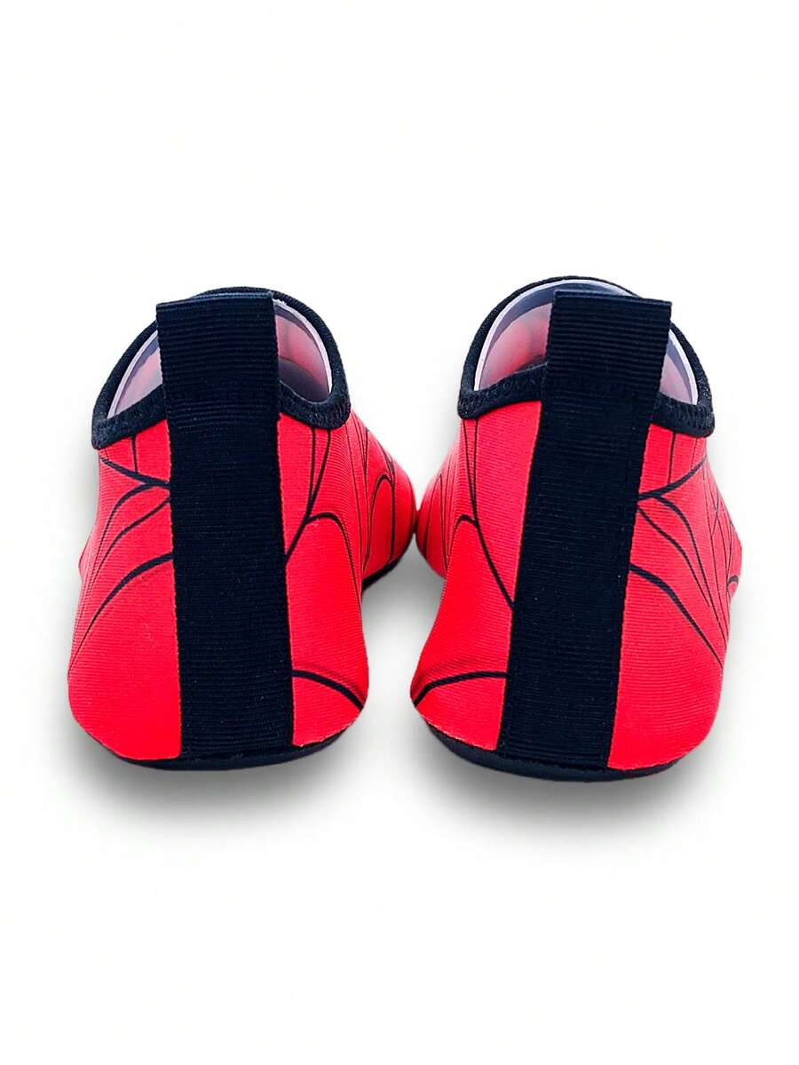 Boys red slip-on water shoes with spider pattern, breathable fabric upper, contrast binding details, and soft TPR outsole.