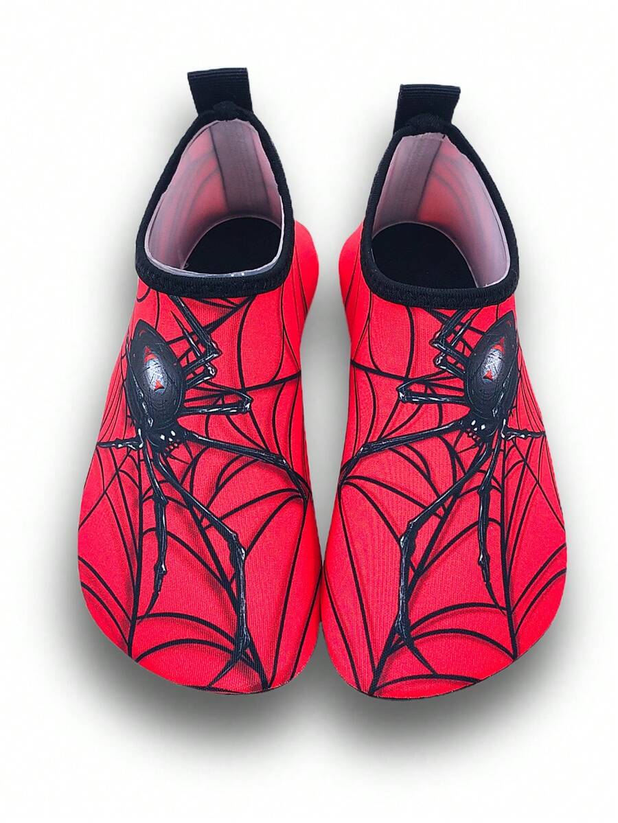 Boys red slip-on water shoes with spider pattern, breathable fabric upper, contrast binding details, and soft TPR outsole.