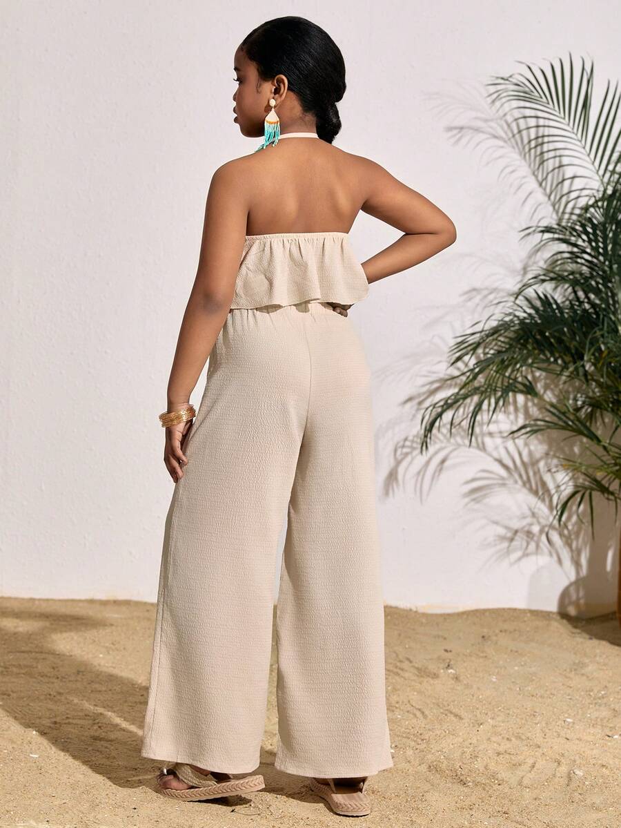 Tween girls casual apricot striped two-piece set featuring a sleeveless halter short top with curved hem and matching long pants.
