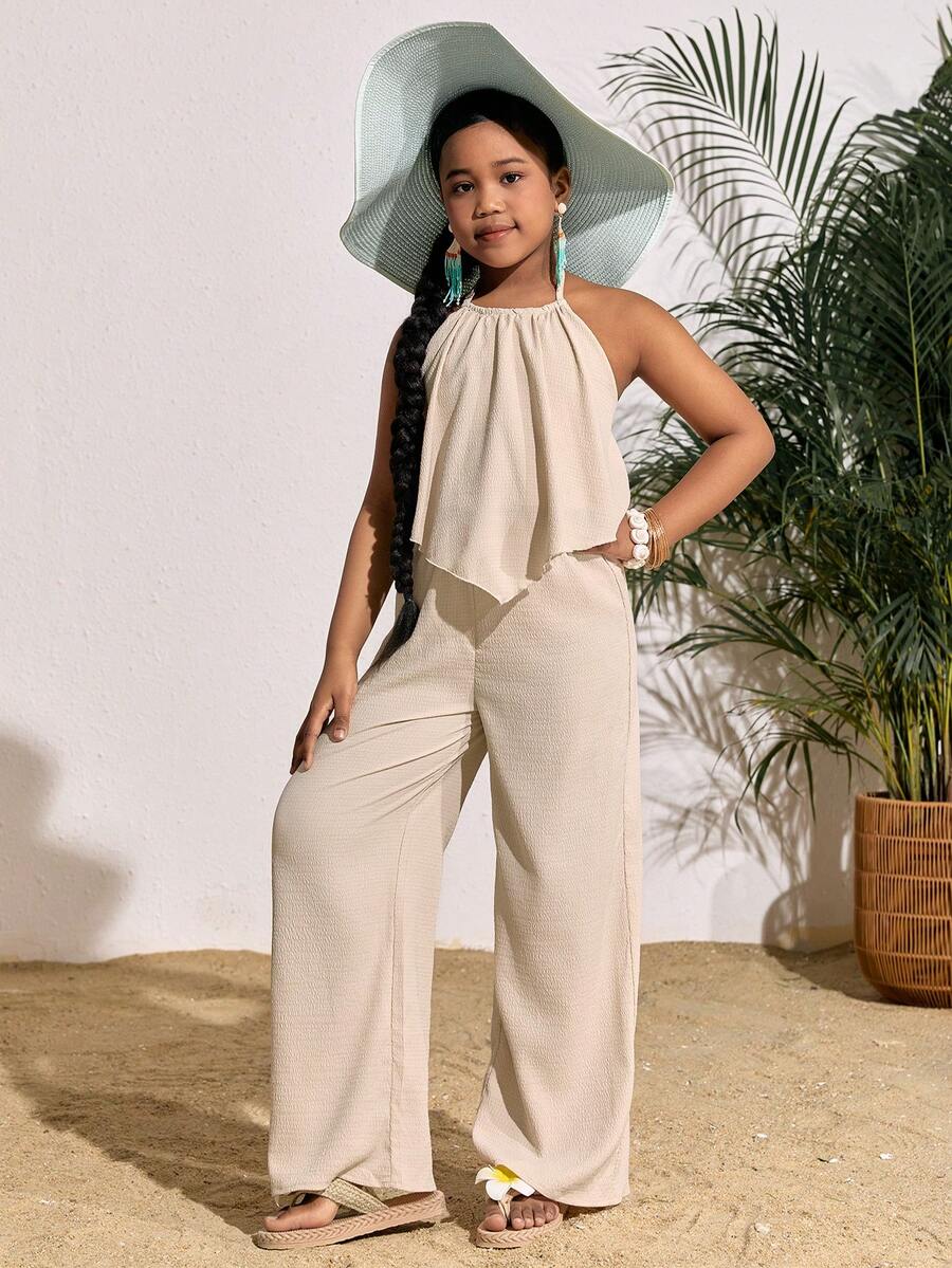 Tween girls casual apricot striped two-piece set featuring a sleeveless halter short top with curved hem and matching long pants.