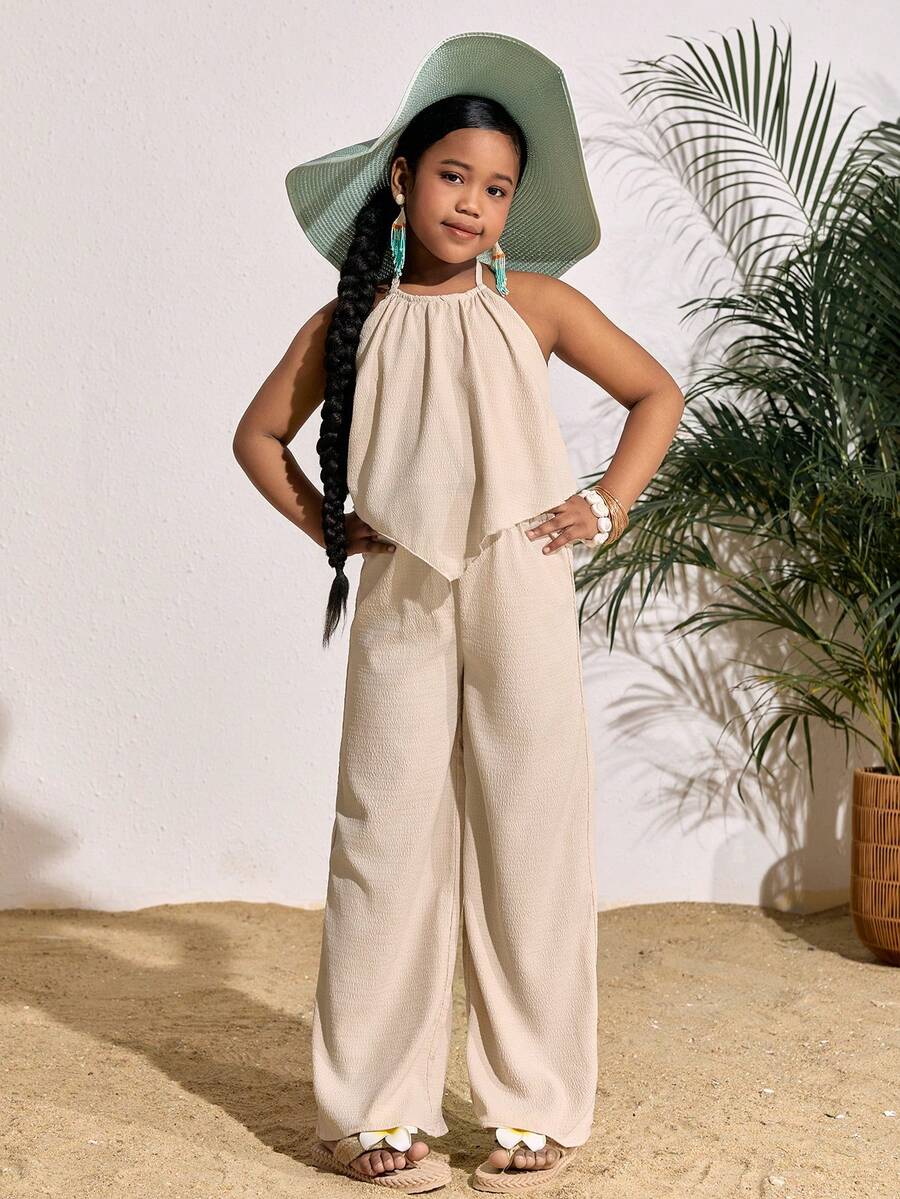 Tween girls casual apricot striped two-piece set featuring a sleeveless halter short top with curved hem and matching long pants.