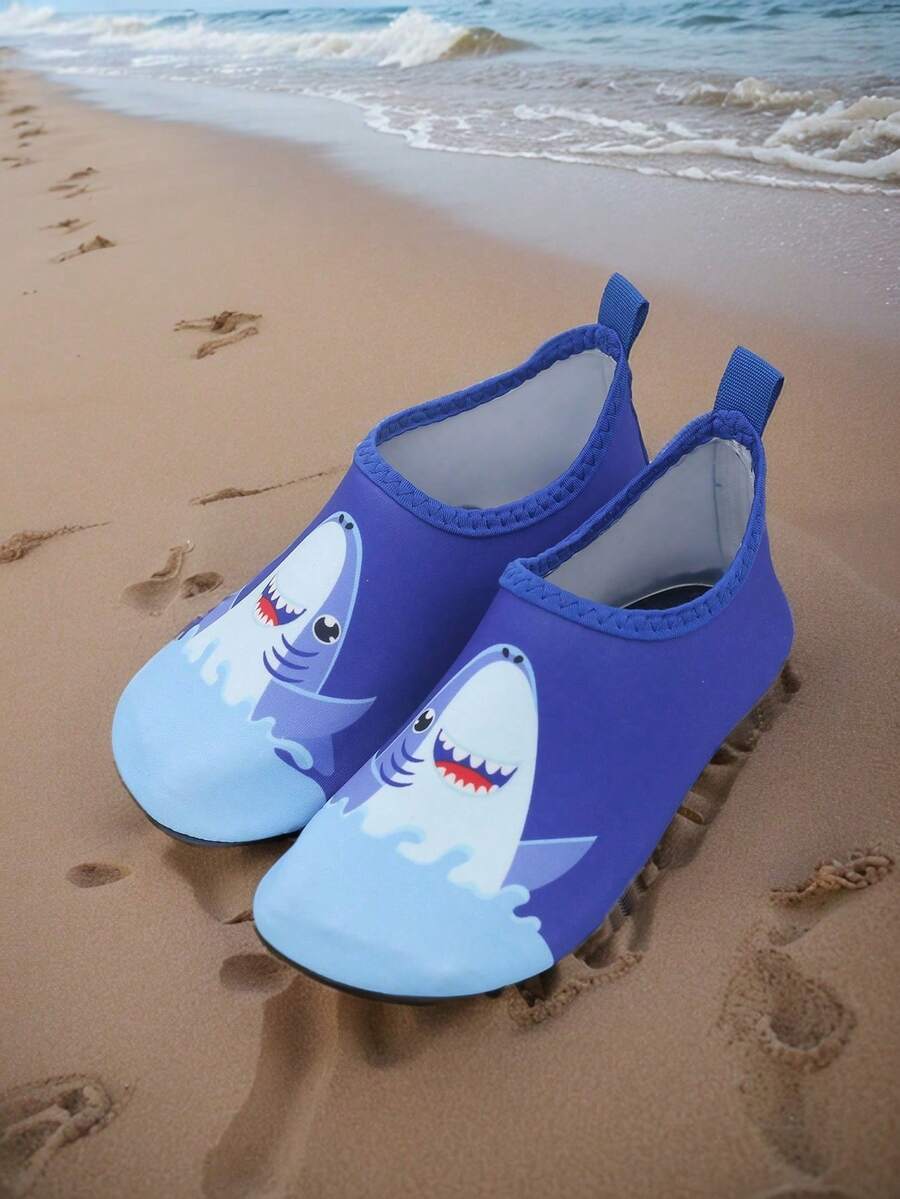 Kids slip-on aqua socks featuring geometric pattern, breathable Lycra upper, and non-slip TPR outsole for beach and water activities.