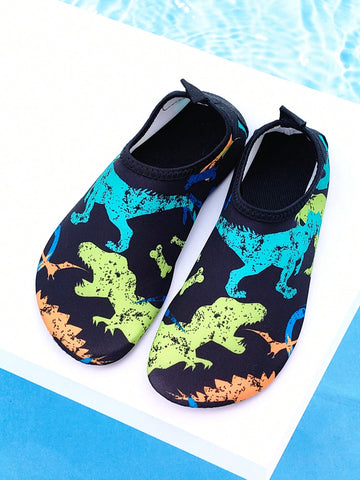 Black kids aqua socks featuring a flame dragon pattern with breathable fabric and flexible TPR soles for beach and swimming activities.