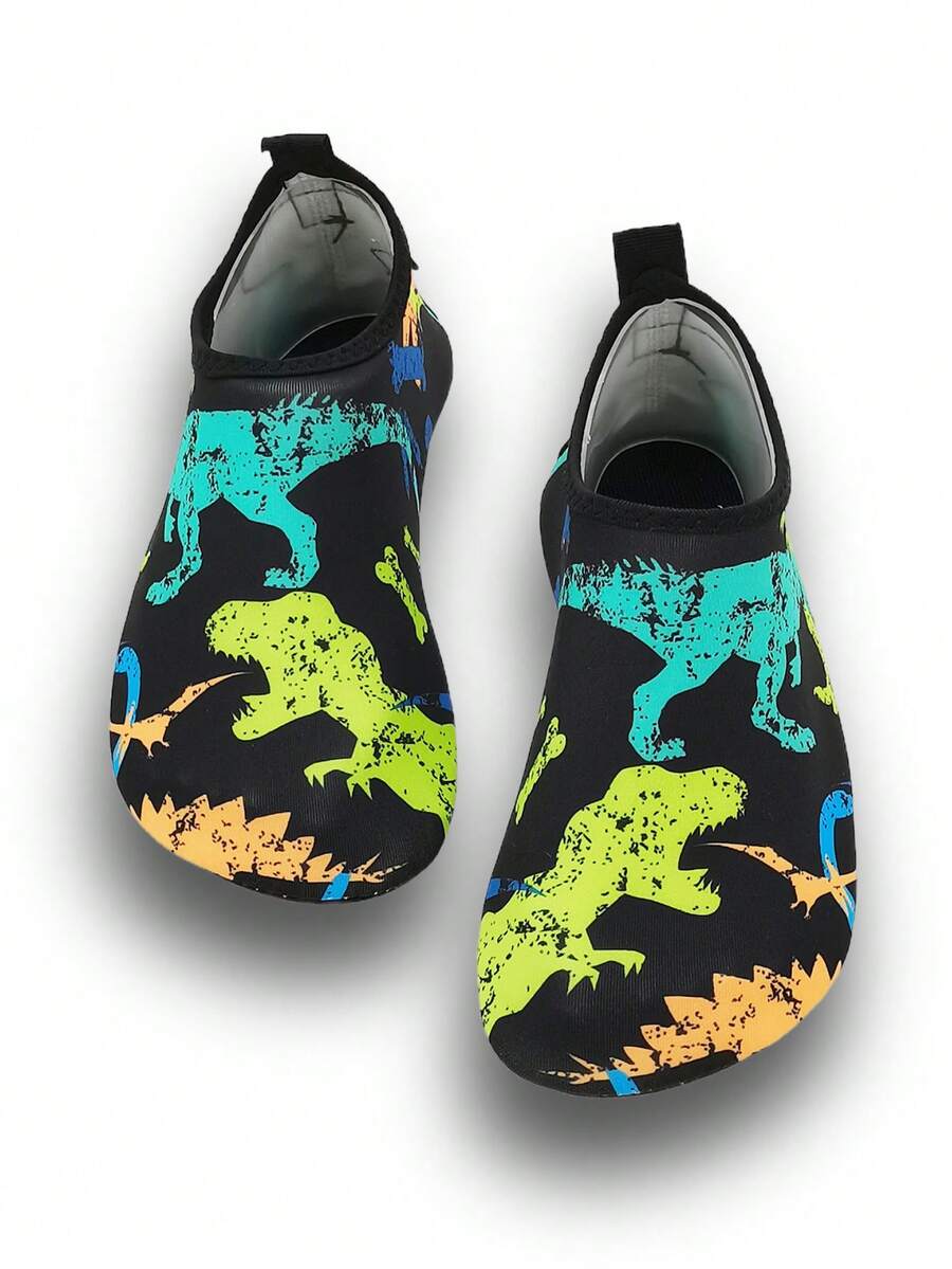 Black kids aqua socks featuring a flame dragon pattern with breathable fabric and flexible TPR soles for beach and swimming activities.