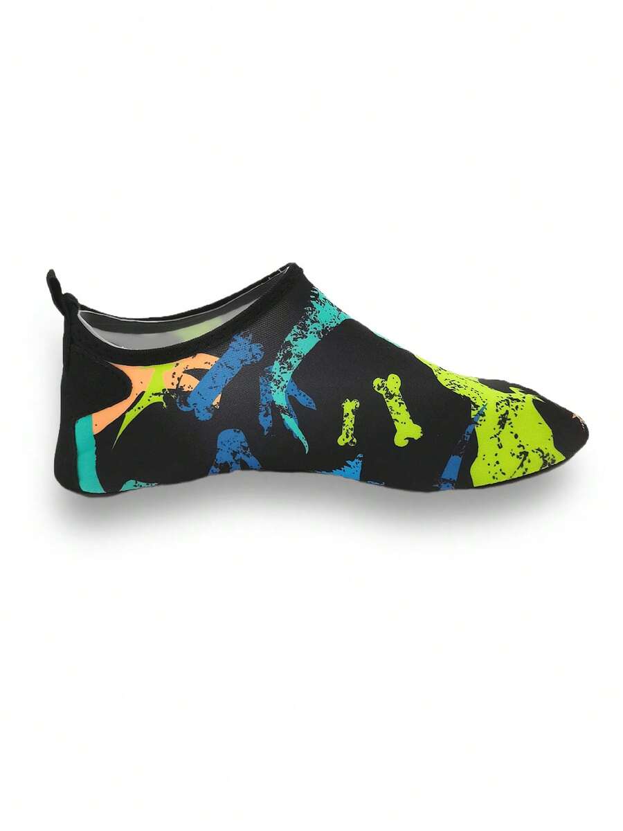 Black kids aqua socks featuring a flame dragon pattern with breathable fabric and flexible TPR soles for beach and swimming activities.