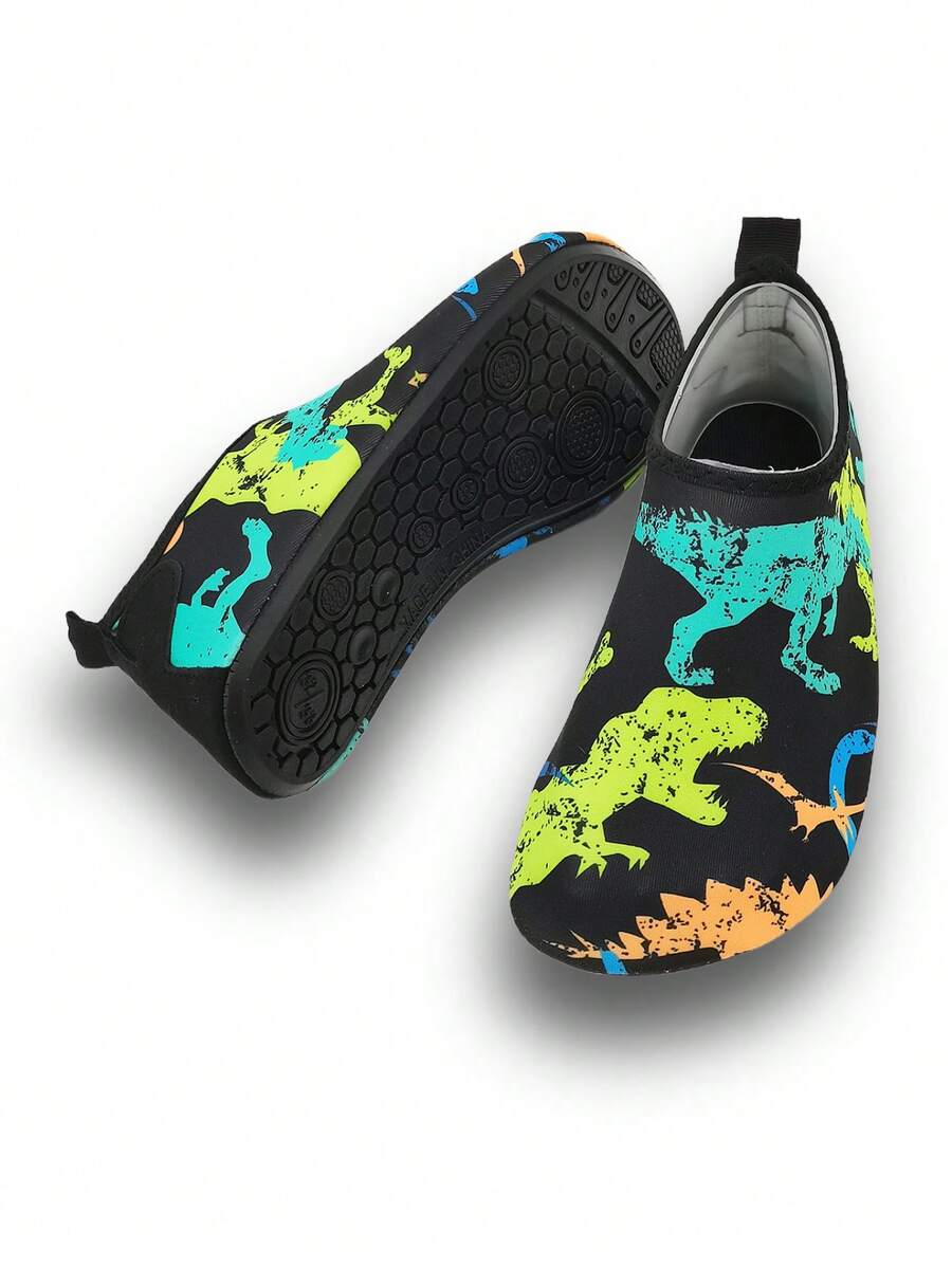 Black kids aqua socks featuring a flame dragon pattern with breathable fabric and flexible TPR soles for beach and swimming activities.