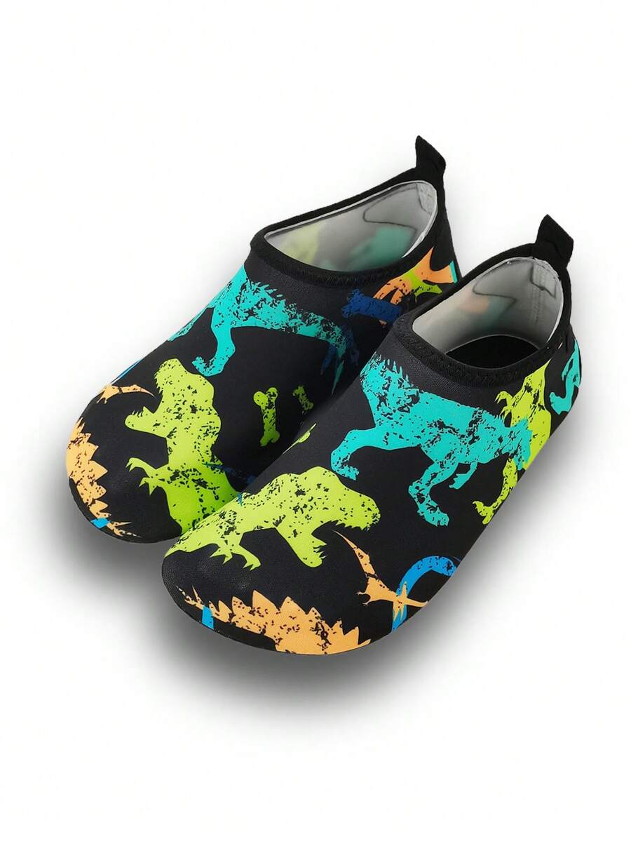Black kids aqua socks featuring a flame dragon pattern with breathable fabric and flexible TPR soles for beach and swimming activities.