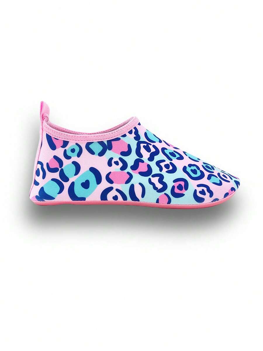 Girls pink slip-on aqua socks with breathable fabric upper and flexible TPR outsole for beach and water activities.
