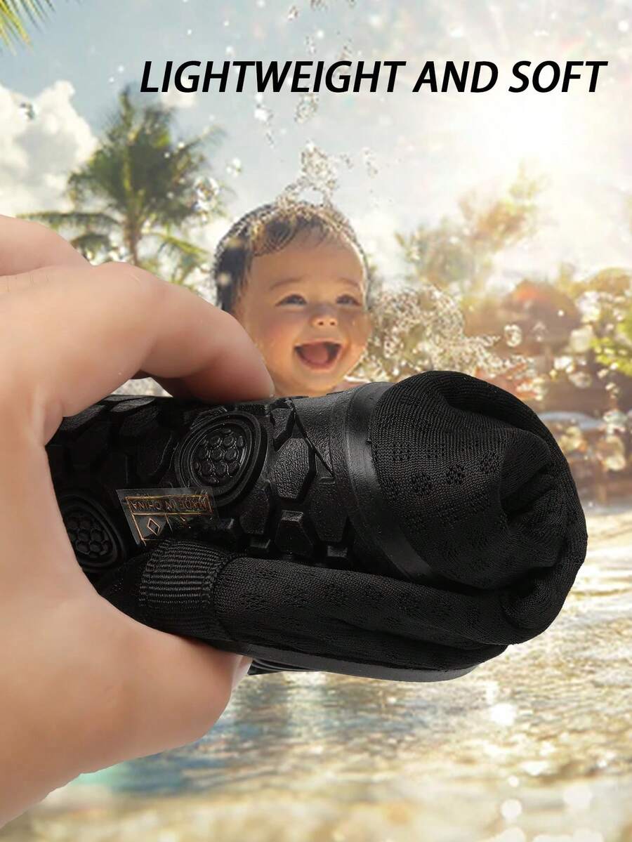 Black slip-on kids water shoes with a graphic pattern fabric upper and wear-resistant rubber outsole for boys and girls.