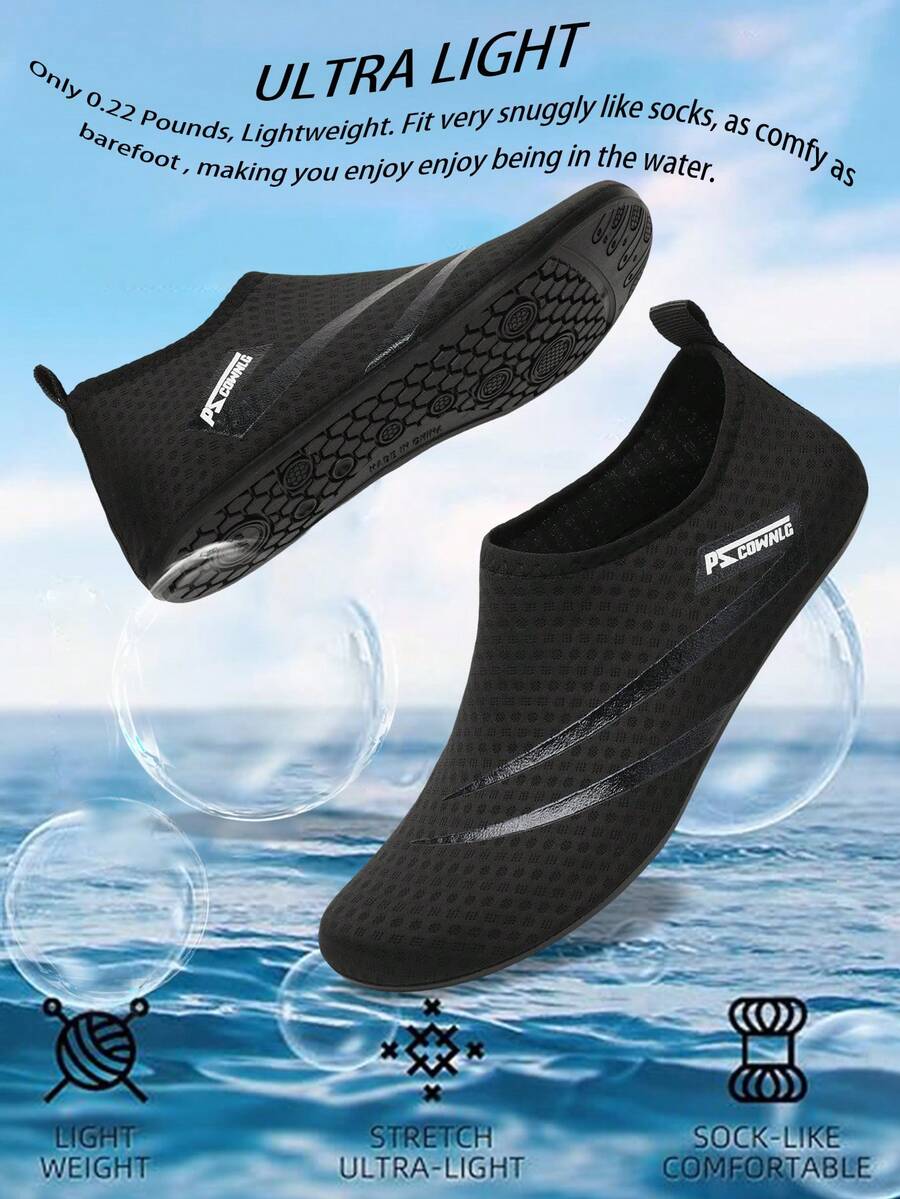 Black slip-on kids water shoes with a graphic pattern fabric upper and wear-resistant rubber outsole for boys and girls.