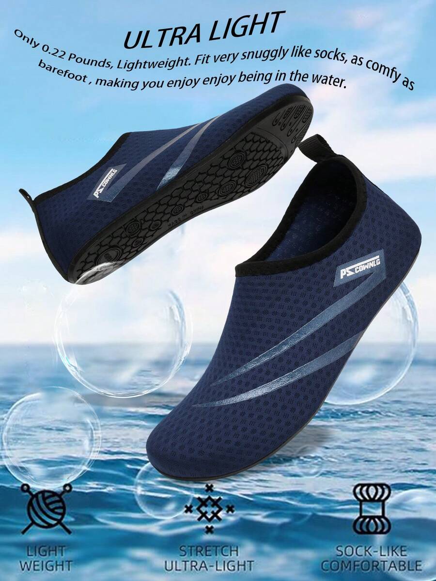 Black slip-on kids water shoes with a graphic pattern fabric upper and wear-resistant rubber outsole for boys and girls.