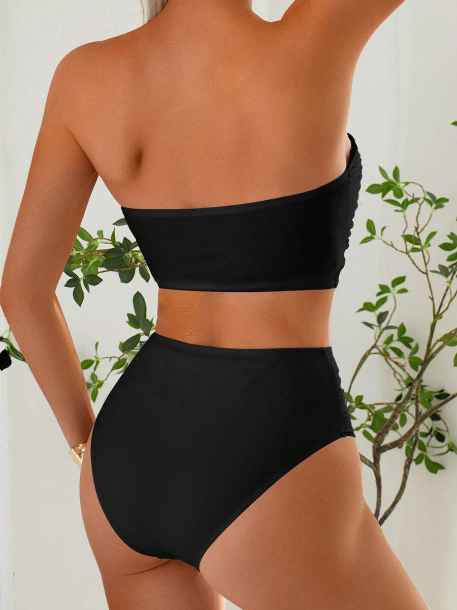Women's black strapless ruched bandeau bikini top with high waisted bottoms