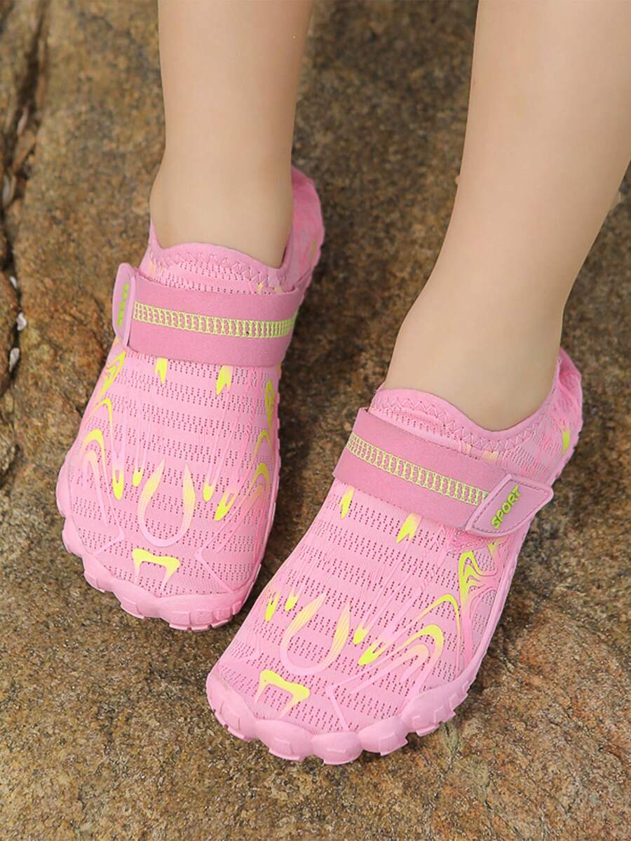 Children's water shoes featuring a breathable mesh upper, hook and loop closure, luminous details, and a non-slip outsole for boys and girls.