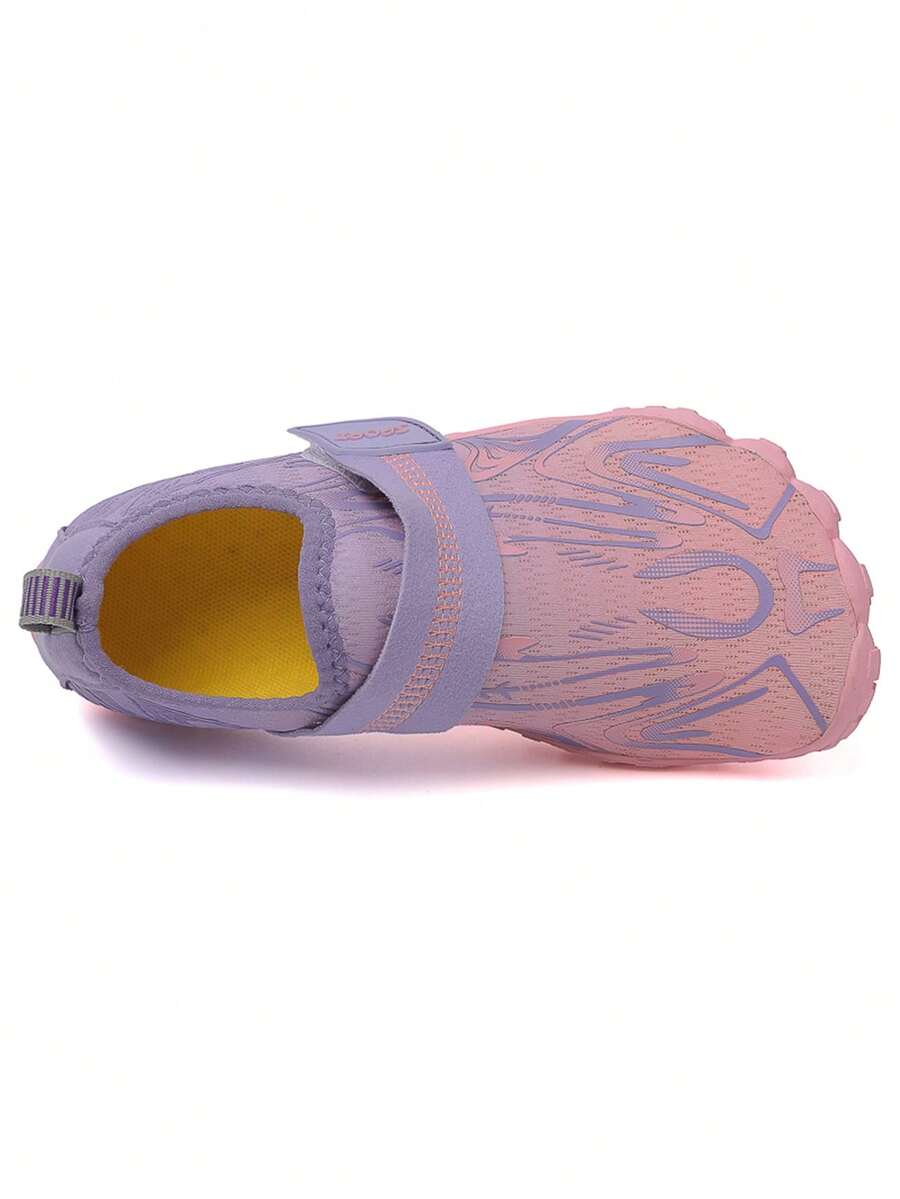 Children's water shoes featuring a breathable mesh upper, hook and loop closure, luminous details, and a non-slip outsole for boys and girls.