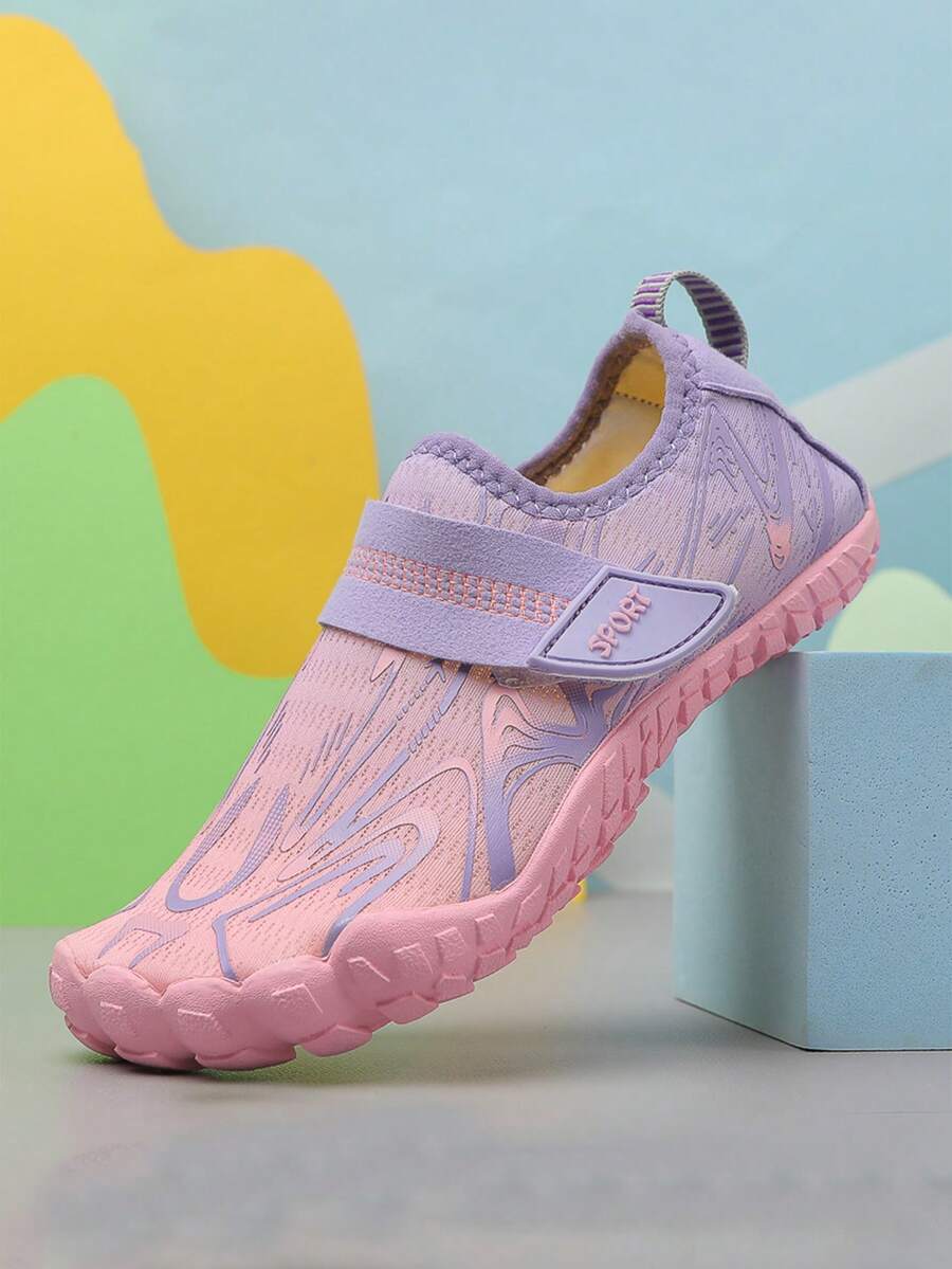 Children's water shoes featuring a breathable mesh upper, hook and loop closure, luminous details, and a non-slip outsole for boys and girls.