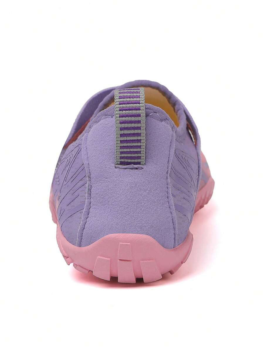 Children's water shoes featuring a breathable mesh upper, hook and loop closure, luminous details, and a non-slip outsole for boys and girls.