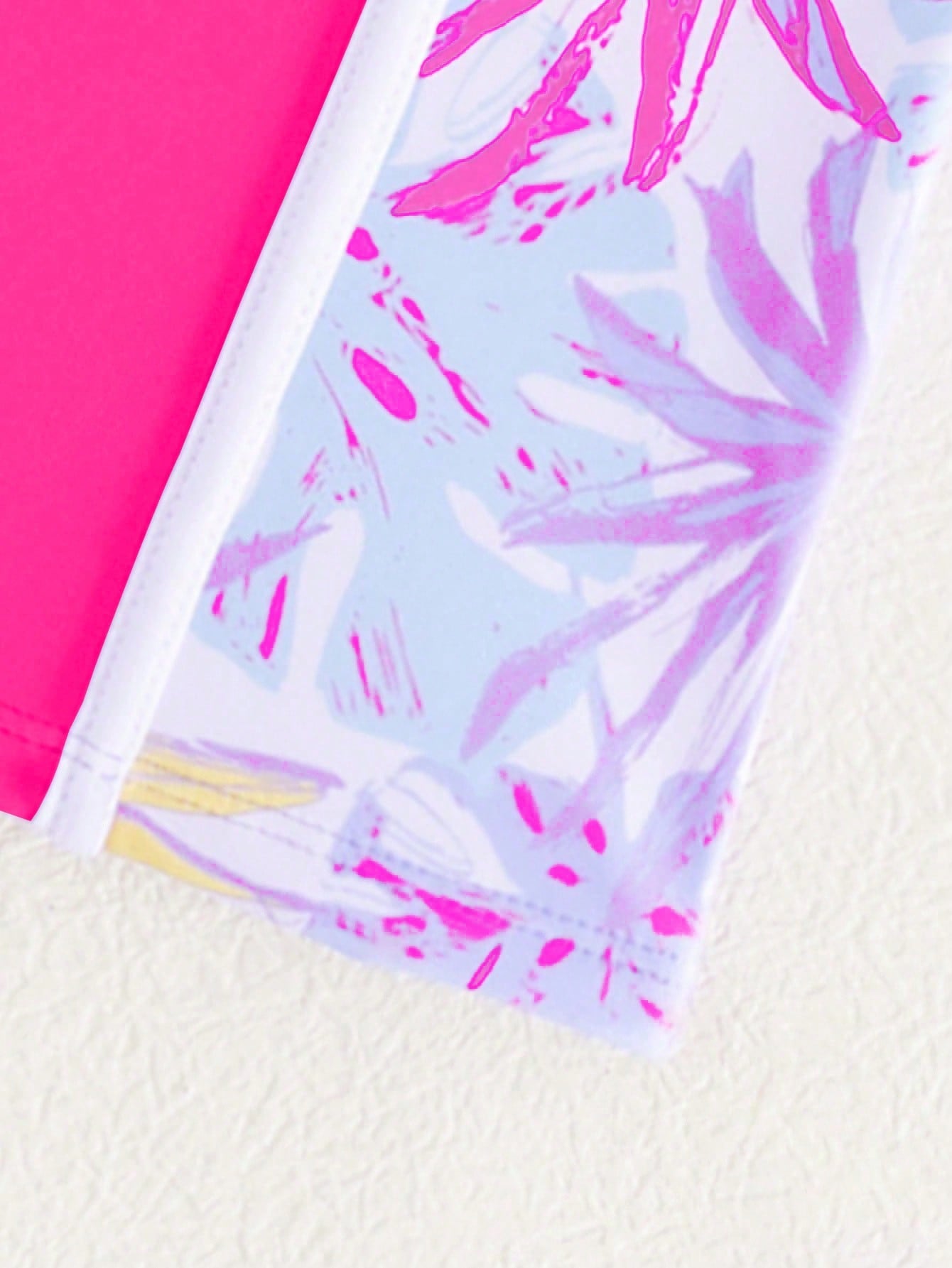 Tween girls colorblock camisole romper swimsuit with spaghetti straps, appliques, all-over print, fitted short silhouette, and medium-stretch fabric for beach, pool, and vacation wear.