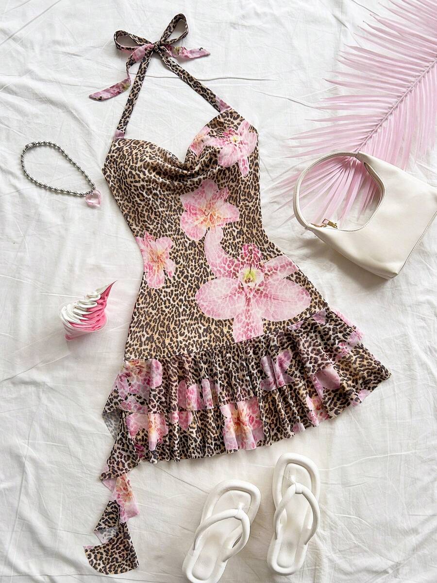 Pink sleeveless tween girls vacation cami dress with spaghetti straps, tiered layer detail, flounce ruffle hem, slim fit, and built-in shorts.