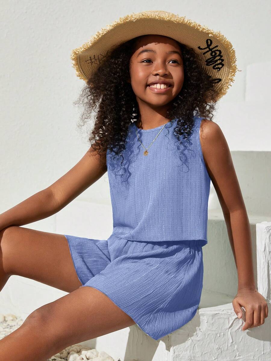 Tween girls army green casual outfit featuring a sleeveless round neck top with button details paired with matching woven loose shorts.
