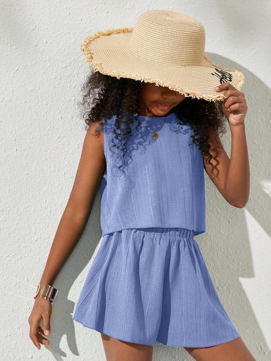Tween girls army green casual outfit featuring a sleeveless round neck top with button details paired with matching woven loose shorts.