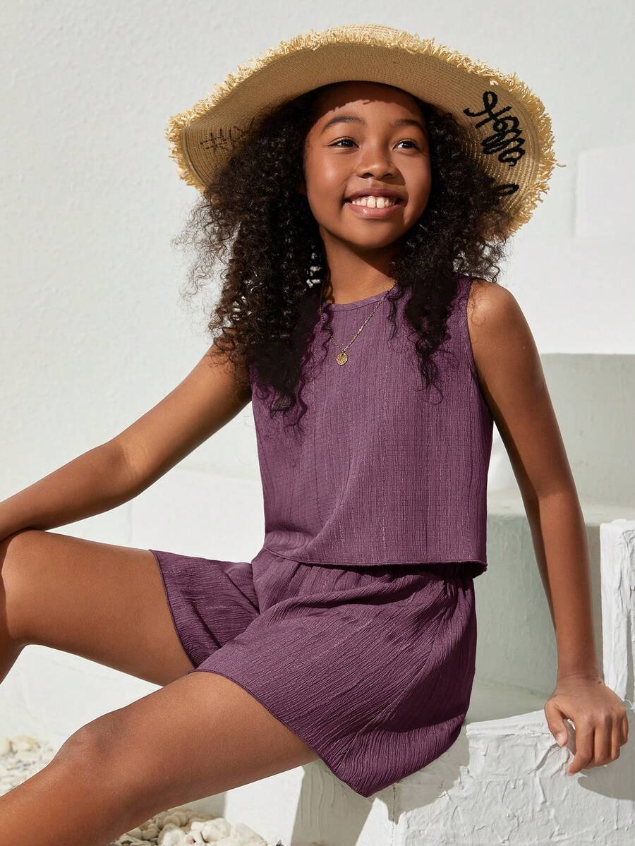 Tween girls army green casual outfit featuring a sleeveless round neck top with button details paired with matching woven loose shorts.