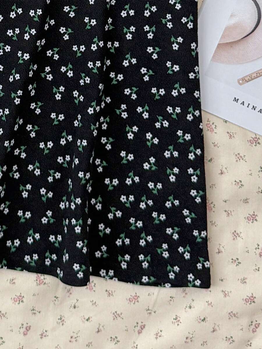 Tween girls' black and white ditsy floral plant print high waist flared camisole dress with a short sleeve t-shirt set.